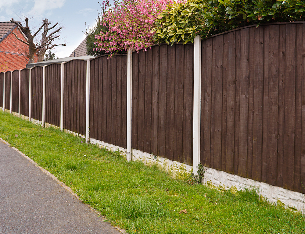 Garden fence panels between concrete posts